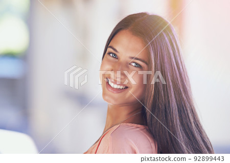 Glowingly beautiful. Cropped shot of a confident young woman. 92899443