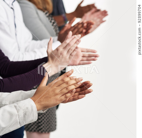 Well done. Shot of a group of people clapping their hands together. 92899704