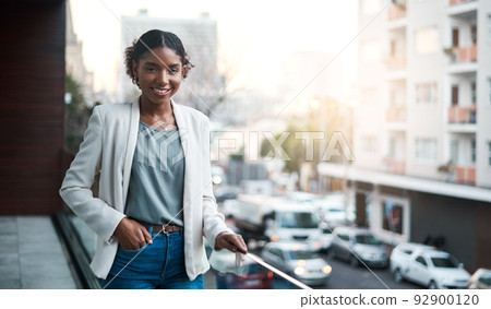 Trendy, young and cool millennial businesswoman happy to start her first day at work at a creative company with urban city copy space background. Portrait face of one edgy marketing intern 92900120
