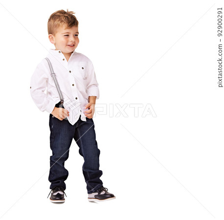 Dressed to impress. A cute little boy posing on a white background. 92900291