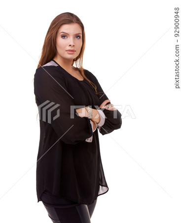 Casual and confident. Studio portrait of an attractive brunette isolated on white. 92900948