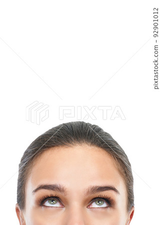 Coming up with ideas.... Cropped image of a womanamp039s face looking away against a white background. 92901012