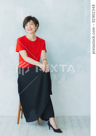 woman in red t-shirt woman in red t-shirt 92902348