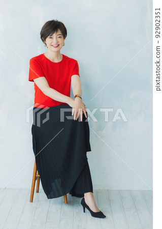 woman in red t-shirt woman in red t-shirt 92902351