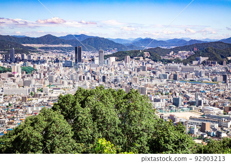 This is the urban landscape of the east side of Hijiyama Park, Hiroshima City. A view of Hijiyama-cho and Danbara-cho to the south from Hiroshima Station. precision image 92903213
