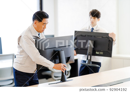 Business scene, computer installer, work clothes 92904192