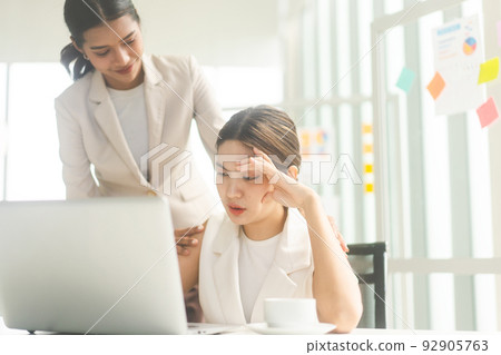 Business asian woman depressed sad from workplace talking with friend mental health psychotherapy Business asian woman depressed sad from workplace talking with friend mental health psychotherapy 92905763