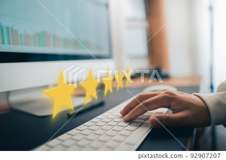 Hand and Phone With Five Star Rating Hand and Phone With Five Star Rating 92907207