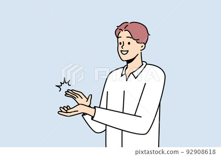Smiling man clap hands  92908618