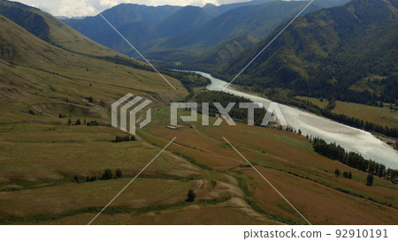 Aerial view from on valley and mountains of Ak-Kem with river Katun in Altai Aerial view from on valley and mountains of Ak-Kem with river Katun in Altai 92910191