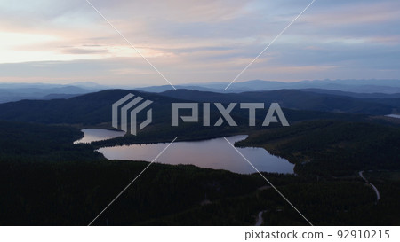 Dramatic sky and lakes in valley of Altai in evening time Dramatic sky and lakes in valley of Altai in evening time 92910215