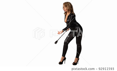 Beautiful woman in latex suit with whip on a white background Beautiful woman in latex suit with whip on a white background 92911593