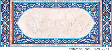 Detail of traditional persian mosaic wall with geometrical and floral ornament, Iran. Horizontal frame with ceramic tile Detail of traditional persian mosaic wall with geometrical and floral ornament, Iran. Horizontal frame with ceramic tile 92912241