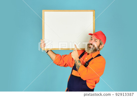 Engineer project, copy space. architect and engineering draw. contractor giving presentation. Presentation on flipchart plan for construction. Builder men points on flipchart. engineer worker career Engineer project, copy space. architect and engineering draw. contractor giving presentation. Presentation on flipchart plan for construction. Builder men points on flipchart. engineer worker career 92913387