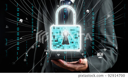 Businessman show hologram of cyber security management allusive technology 92914700