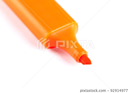 Orange highlighter isolated over white background. Close-up view 92914977