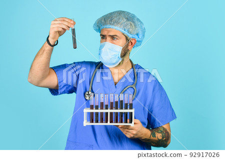 carrier of coronavirus. protective measures. coronavirus in China. Laboratory Center Checks for blood test result. Feeling Unwell. man doctor work in hospital laboratory. Virus threat level 92917026
