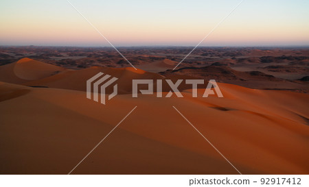 Sunrise view to Tin Merzouga dune, Tassili nAjjer national park, Algeria 92917412