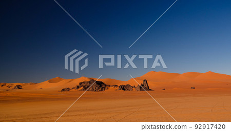 sunset view to Tin Merzouga dune at Tassili nAjjer national park, Algeria sunset view to Tin Merzouga dune at Tassili nAjjer national park, Algeria 92917420