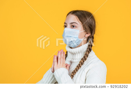 sick girl kid in protection mask during covid19 pandemic outbreak, meditating sick girl kid in protection mask during covid19 pandemic outbreak, meditating 92918202
