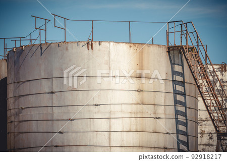 Close up of a large tanks at cargo terminal 92918217
