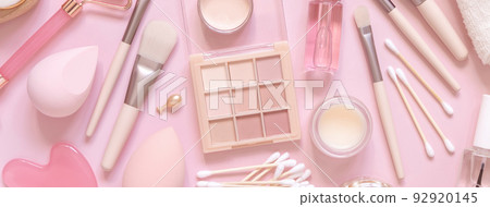 Natural skin care products and decorative cosmetics on light pink, top view Natural skin care products and decorative cosmetics on light pink, top view 92920145
