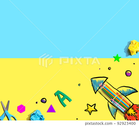 Back to school theme with a rocket with school supplies Back to school theme with a rocket with school supplies 92923400