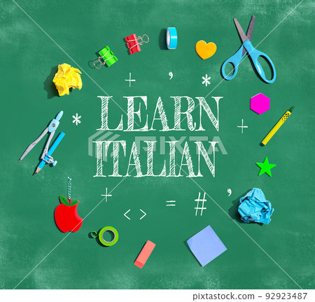 Learn Italian theme with school supplies on a chalkboard 92923487