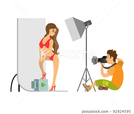 Model in Swimsuit and Photographer at Photo Studio Model in Swimsuit and Photographer at Photo Studio 92924595