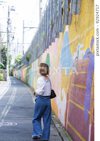 A woman walking 92924717