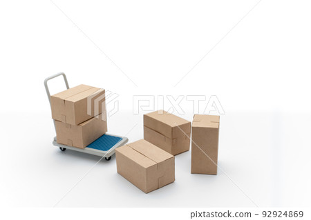Collapsed luggage, cardboard boxes on a trolley 92924869