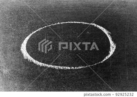 White chalk hand drawing as circle or round shape on blackboard or chalkboard background with copy space 92925232