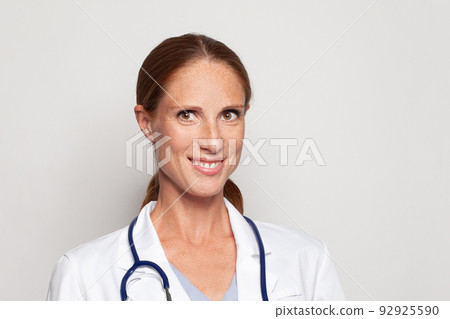Closeup portrait of optimistic medical woman doctor or nurse Closeup portrait of optimistic medical woman doctor or nurse 92925590