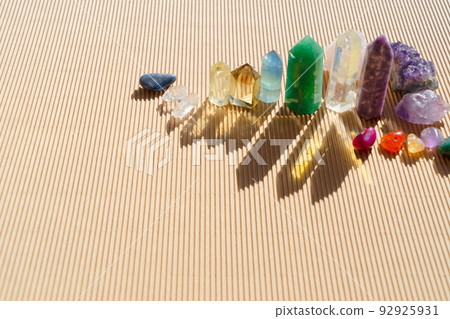 Healing crystals on brown background 92925931
