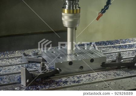 The CNC milling machine rough cutting the injection mold parts by indexable tools. 92926889