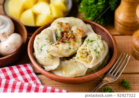Potato mushroom stuffed vareniky, pierogi or dumplings Potato mushroom stuffed vareniky, pierogi or dumplings 92927322