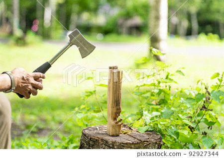 Chopping firewood camping outdoor 92927344