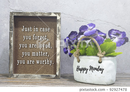 Inspirational and inspirational quote on wooden frame. Inspirational and inspirational quote on wooden frame. 92927478