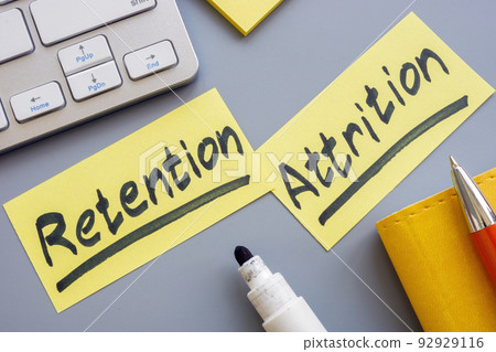 Pieces of papers with words Retention and attrition. Pieces of papers with words Retention and attrition. 92929116
