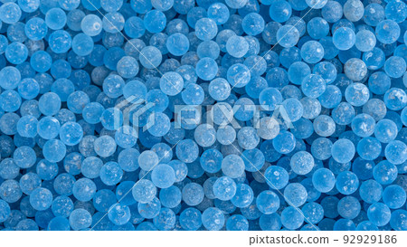 Lots of frosted blue glass ball poured into the ground for foot massage Lots of frosted blue glass ball poured into the ground for foot massage 92929186