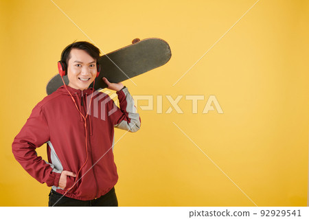 Happy Man with Skateboard Happy Man with Skateboard 92929541
