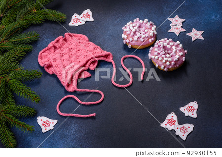 Pink cap for a young child. Clothing in the first days of the child's life Pink cap for a young child. Clothing in the first days of the child's life 92930155
