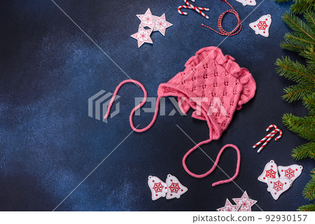 Pink cap for a young child. Clothing in the first days of the child's life 92930157