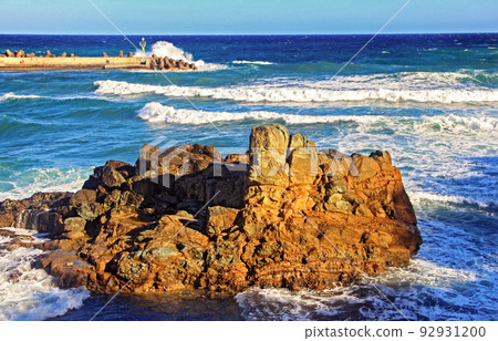 Big rock and stormy sea at Crete island in Greece 92931200