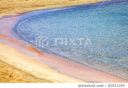 Shallow clear sea with pink sand at Elafonisi, Crete island - Greece Shallow clear sea with pink sand at Elafonisi, Crete island - Greece 92931265