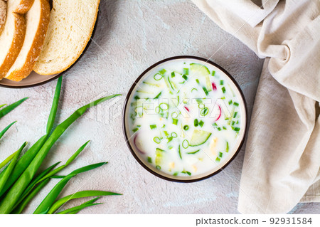 Ready to eat traditional Russian cold soup in a bowl. Homemade food. Top view 92931584
