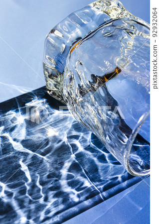 Beautiful caustic effect as light passes through a glass. Restaurant and beverage advertising backdrop 92932064