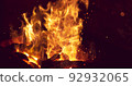 Burning fire in blacksmith's workshop forge 92932065