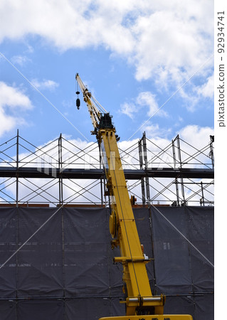 Scaffolding installed at construction site Scaffolding installed at construction site 92934741