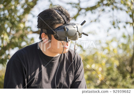 A man who operates an FPV drone that can shoot images like a bird from a first-person perspective 92939682